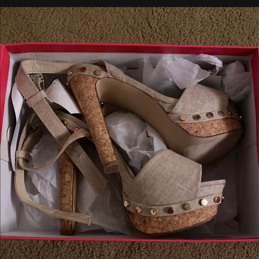 Tan high heels opened toe. Size 7.5